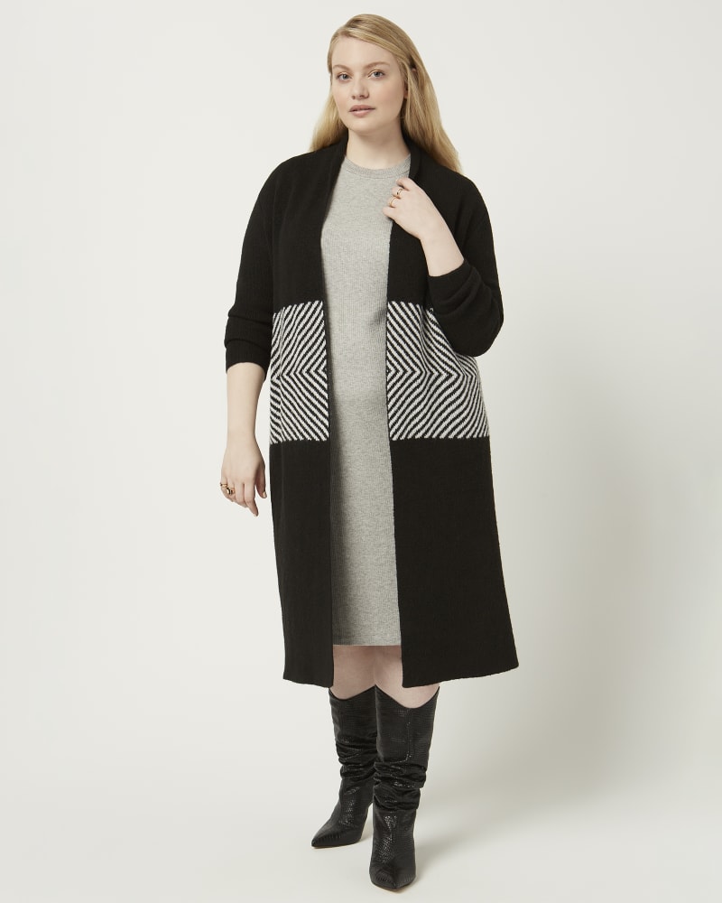 Front of a model wearing a size 1X Rhea Long Sleeve Shawl Cardigan in Black / Ivory by Molly & Isadora. | dia_product_style_image_id:210748